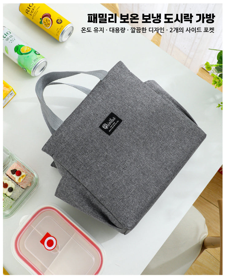 a gray bag sitting on top of a white table