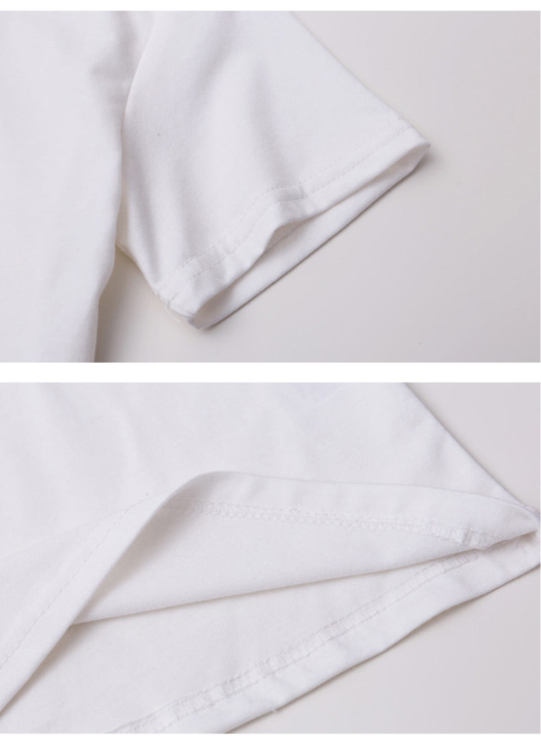 a close up of a white t - shirt on a white surface