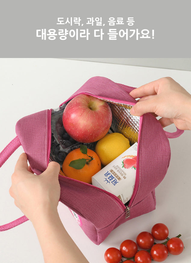 a person holding a pink bag filled with fruit